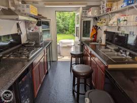 1999, Tracker, 24 Custom Floating Kitchen